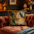 Load image into Gallery viewer, Decorative pillow with a tiger design on a brown sofa in a cozy room.