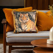 Load image into Gallery viewer, Decorative pillow with a tiger design on a sofa with orange cushions.